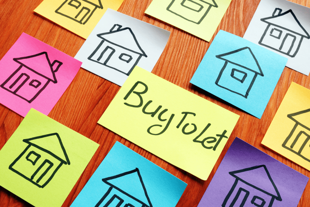 sticky notes with houses and buy to let on them