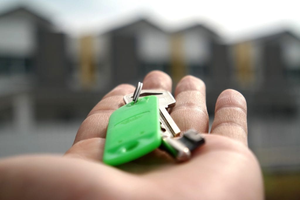 close up image of key ring in palm of hand