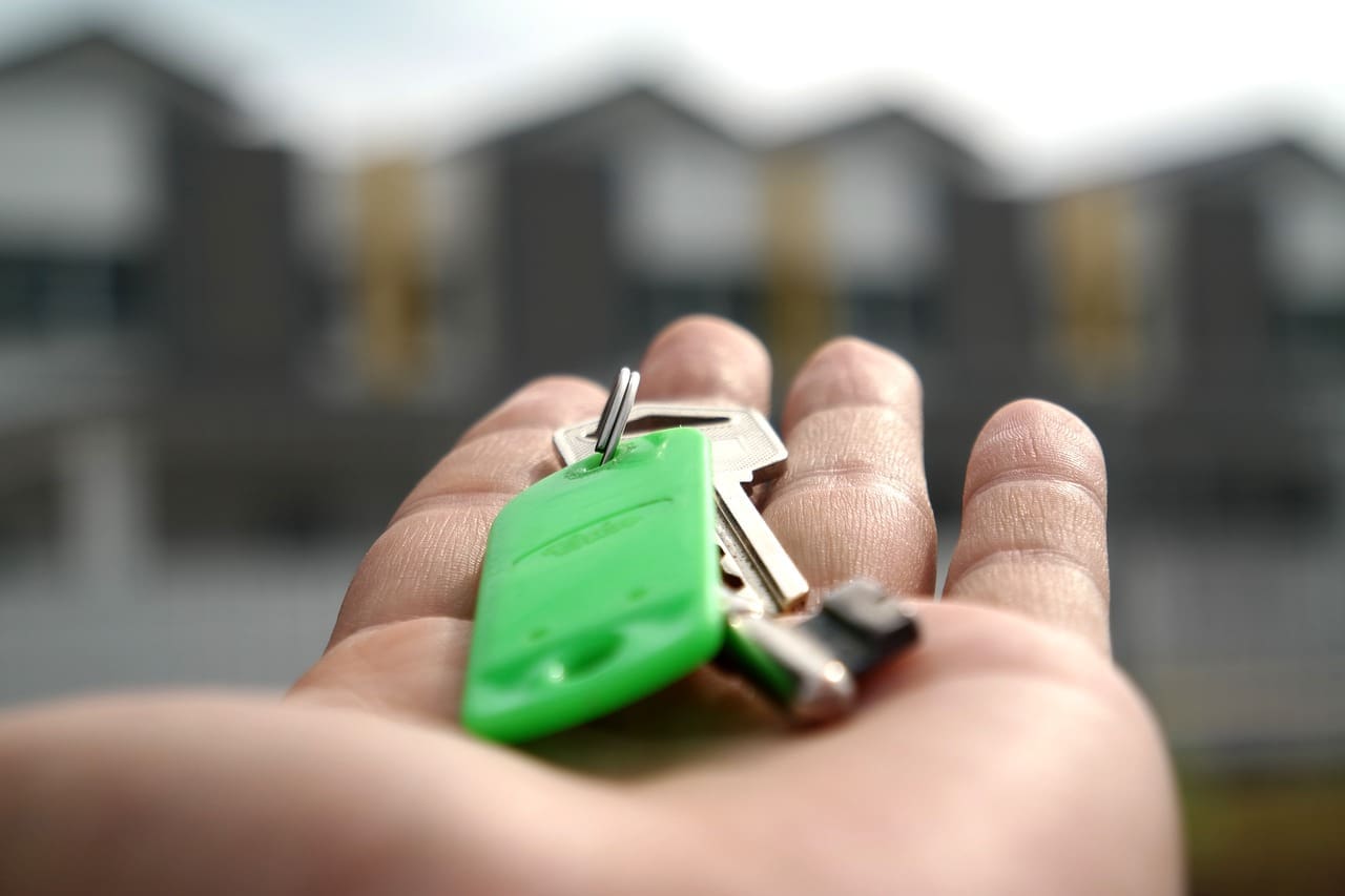 close up of key rings in palm of hand