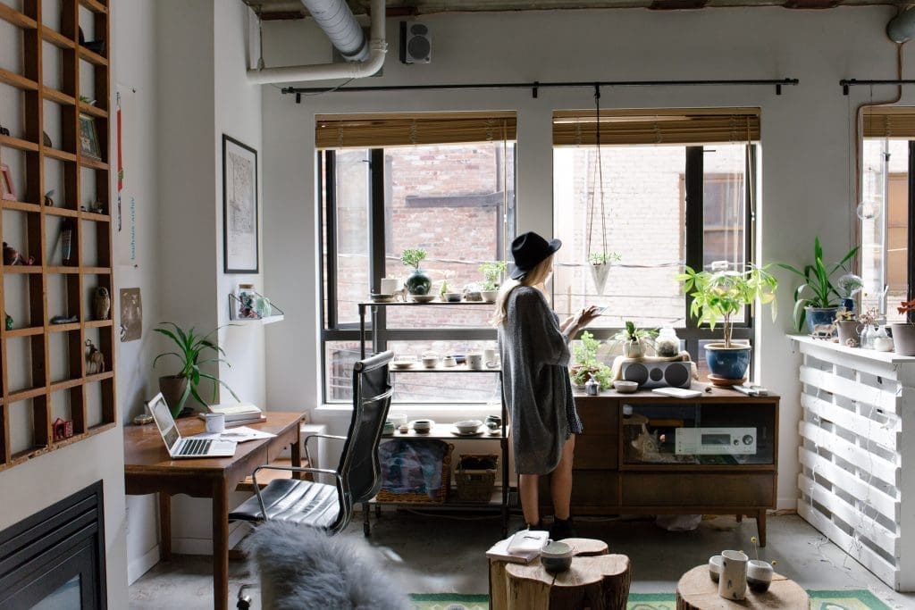 a woman stood in her apartment