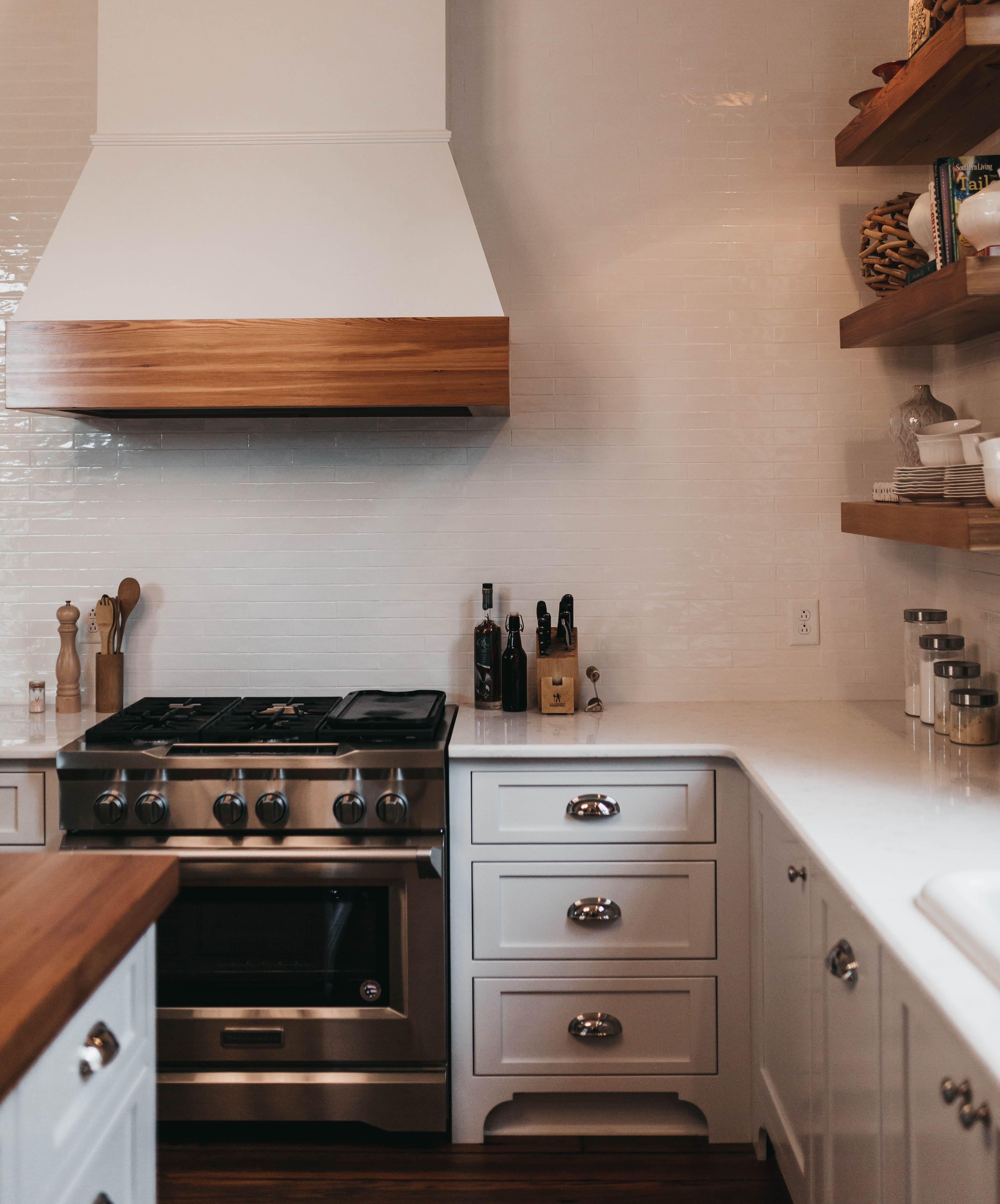 a white and wood kitchen